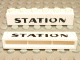 Part No: crssprt02pb01 Name: Brick 1 x 6 without Bottom Tubes with Cross Side Supports with Black 'STATION' Pattern Part No: crssprt02pb01 Name: Brick 1 x 6 without Bottom Tubes with Cross Side Supports with Black 'STATION' Pattern