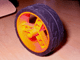 Part No: 32247c01 Name: Wheel 41 mm Znap Thin Tread with Black Tire 41 mm Directional Tread Part No: 32247c01 Name: Wheel 41 mm Znap Thin Tread with Black Tire 41 mm Directional Tread