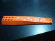 Part No: 45301pb002 Name: Wedge 16 x 4 Triple Curved with Bullet Holes and Asian Characters Pattern (Sticker) - Set 7705 Part No: 45301pb002 Name: Wedge 16 x 4 Triple Curved with Bullet Holes and Asian Characters Pattern (Sticker) - Set 7705