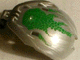 Part No: 41671pb06 Name: Bionicle Bohrok Windscreen 4 x 5 x 7 with Green Scales and Lehvak-Kal Logo Part No: 41671pb06 Name: Bionicle Bohrok Windscreen 4 x 5 x 7 with Green Scales and Lehvak-Kal Logo