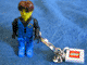 Gear No: KC046  Name: Jack Stone, Blue Pants and Vest with Black Shirt Key Chain with 2 x 2 Square Lego Logo Tile