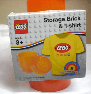 Storage Brick Round 1 x 1 Trans Orange with Yellow Shirt
