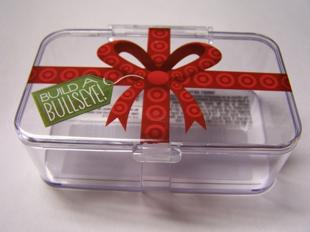 Storage Box Plastic with 'Build a Bullseye!' and Red Ribbon Pattern