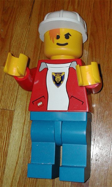 Display Figure 7in x 11in x 19in (red jacket, blue pants, white T-Shirt with Royal Knights logo, construction helmet)