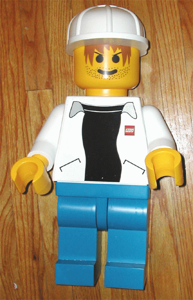 Display Figure 7in x 11in x 19in (white jacket, blue pants, black T-Shirt, construction helmet)