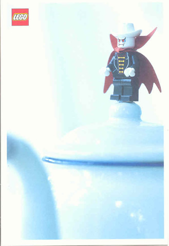 Postcard - Lego Art Project 2002 - 031 - Dracula Minifigure on Top of Container Lid