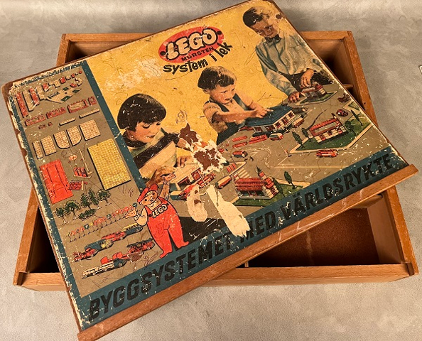 Wooden Storage Box with 'System i lek' Pattern