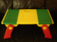 Gear No: 6787c01  Name: Playtable with Red Folding Legs with Compartment Covers