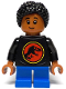 Minifig No: jw127  Name: Junior Paleontologist - Girl, Black Shirt with Jurassic Park Logo, Blue Short Legs, Black Hair Braided with Knot Bun