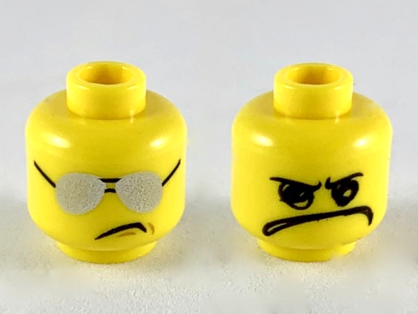 Plain dual-sided head with silver aviator-style sunglasses on one side and a crude black marker-style frown on the other.