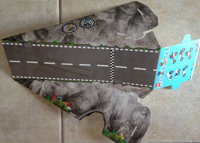 Paper Cardboard Ramp with Tunnel, Checkered Startline, White Stripes and Tire Tracks Pattern