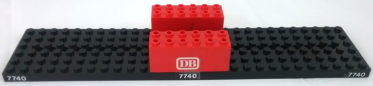 Stickered Assembly 28 x 6 x 2 2/3 with White '7740' and 'DB' Pattern on Both Sides (Stickers) - Set 7740 - 1 Train Base 6 x 28 with 10 Round Holes Each End, 2 Brick, Modified 2 x 6 x 2 Weight - Bottom Openings, Center Seam on Ends