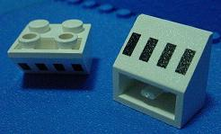 Slope, Inverted 45 2 x 2 with Flat Bottom Pin with 4 Black Rectangles (Ferry Windows) Pattern