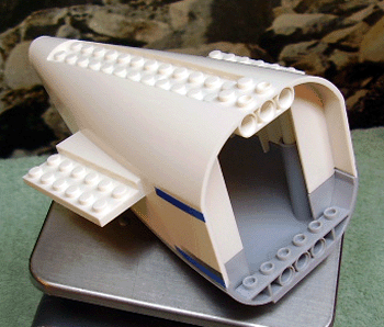 Aircraft Fuselage Aft Section Curved with Fixed Light Bluish Gray Base and White Hard Rubber Tip with Dark Bluish Gray and Blue Stripes Pattern on Both Sides