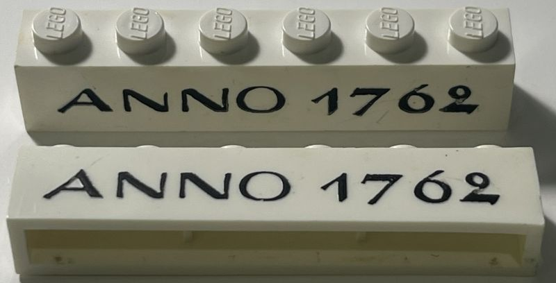 Brick 1 x 6 without Bottom Tubes with Cross Side Supports with Black 'ANNO 1762' Thin Pattern