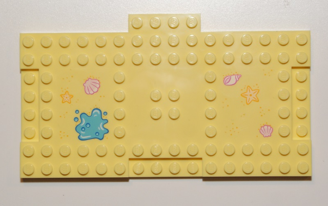 Brick, Modified 8 x 16 with 1 x 4 Indentations and 1 x 4 Plate with Starfish / Sea Stars, Seashells, and Water Puddle Pattern