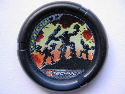 Throwing Disk with Throwbot Blaster 6 Pips, LEGO Technic Logo, and 3 Robots Standing on Rock Pattern
