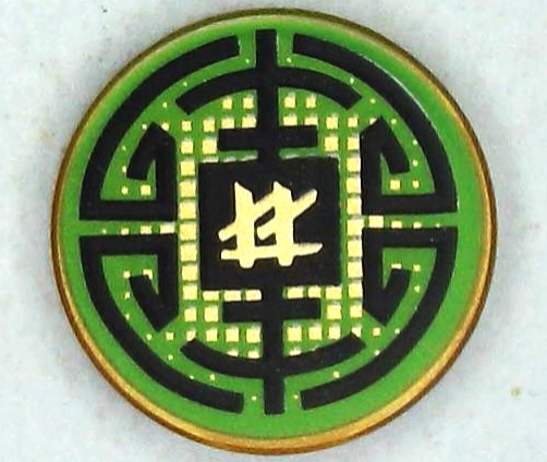 Tile, Round 2 x 2 with Bottom Stud Holder with Black Circular Lines and Gold Squares on Green Background, Ninjago Logogram 'LL' Pattern