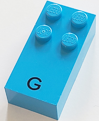 Brick, Braille 2 x 4 with 4 Studs with Black Capital Letter G Pattern (dots-1245 ⠛) (French with Antoine Numbers)