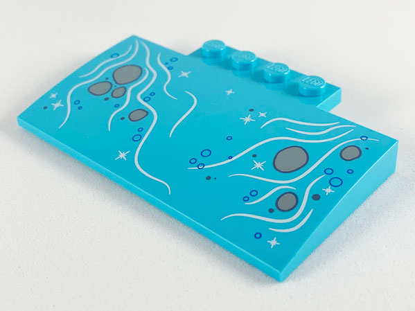 Slope, Curved 5 x 8 x 2/3 with 4 Studs with Bubbles and Light Bluish Gray Rocks in Stream Pattern