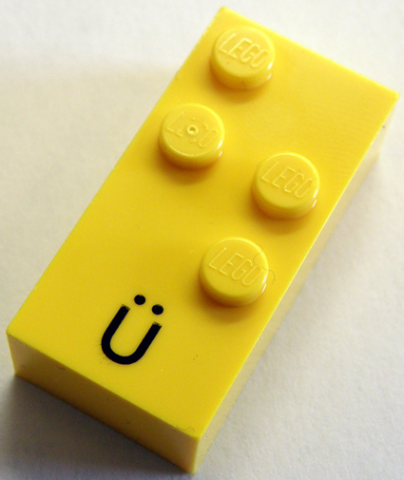 Brick, Braille 2 x 4 with 4 Studs with Black Capital Letter U with Diaeresis (Ü) Pattern (dots-1256 ⠳)