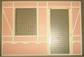 Scala Wall, Vertical Grooved 40 x 2 x 22 2/3 with Window and Door with White Tudor Frame on Light Salmon Background Pattern