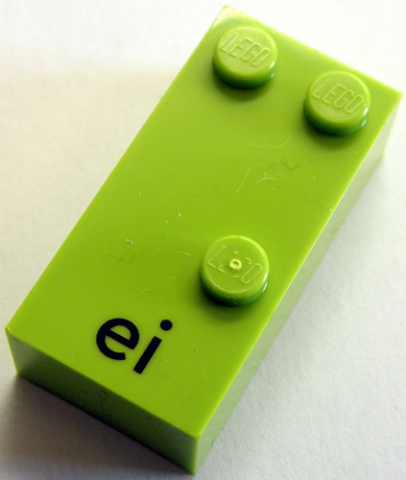 Brick, Braille 2 x 4 with 3 Studs with Black Lowercase Letters ei Pattern (dots-146 ⠩) (German)