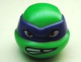 Minifigure, Head, Modified Ninja Turtle with Dark Purple Mask and Missing Tooth Scowl Pattern (Donatello)