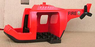 Duplo Helicopter Body Large with Black Base, Red Tail, Black Tail Rotor and Black 'FIRE' Pattern