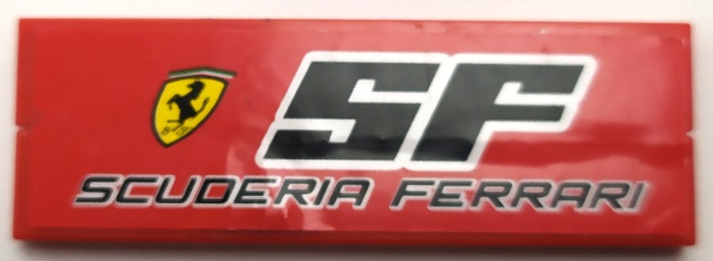 2 autocollants avec logo Ferrari.