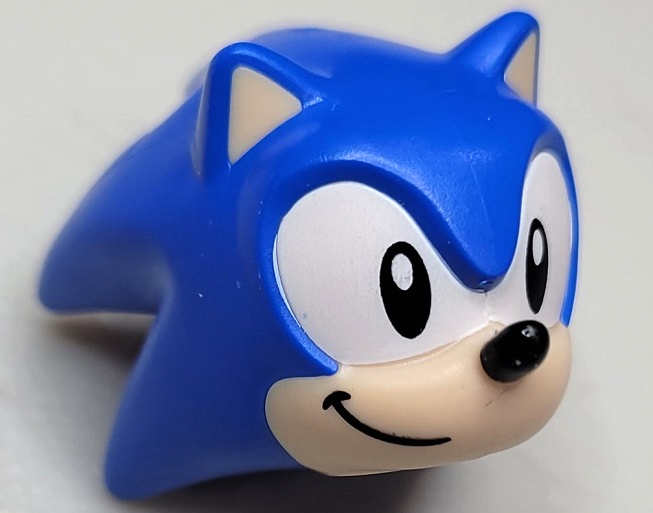 Minifigure, Head, Modified Hedgehog, Sonic with Molded Light Nougat Face and Inner Ears and Printed Black Eyes on White Background, Black Nose and Grin to Right Pattern