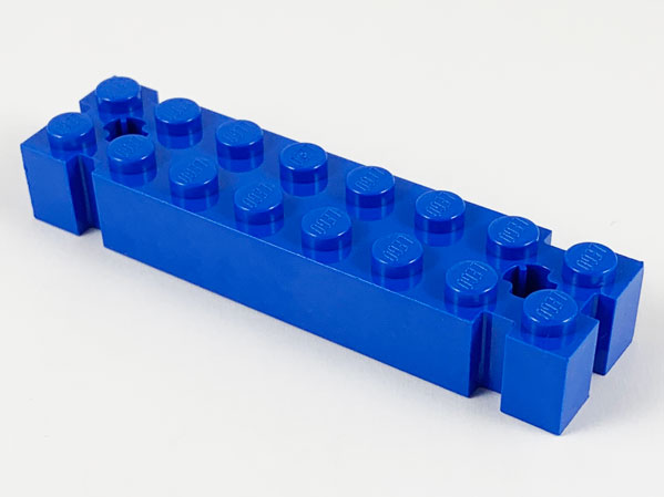 Brick, Modified 2 x 8 with Channels and Axle Holes at Ends