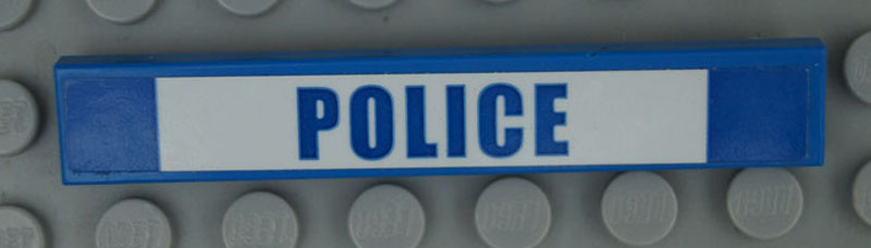 Part 6636pb211 Tile 1 x 6 with Blue POLICE on White Background