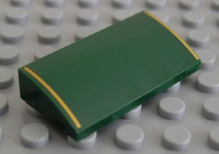 Slope, Curved 2 x 4 x 2/3 with Bottom Tubes with 2 Gold Stripes Pattern