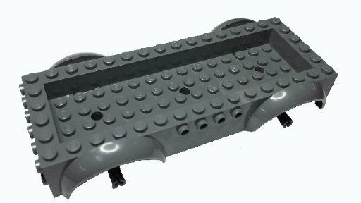 Vehicle, Base 8 x 16 x 2 1/2 with Mudguards 4 x 14 Recessed Center with 3 Holes, and Same Color Wheels Holders Part 18923c00 BrickLink