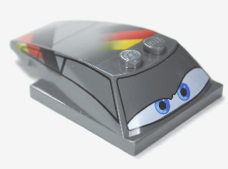 Wedge 6 x 4 x 1 1/3 with 4 x 4 Base with Blue Eyes, Windows and Black, Red and Yellow Pattern