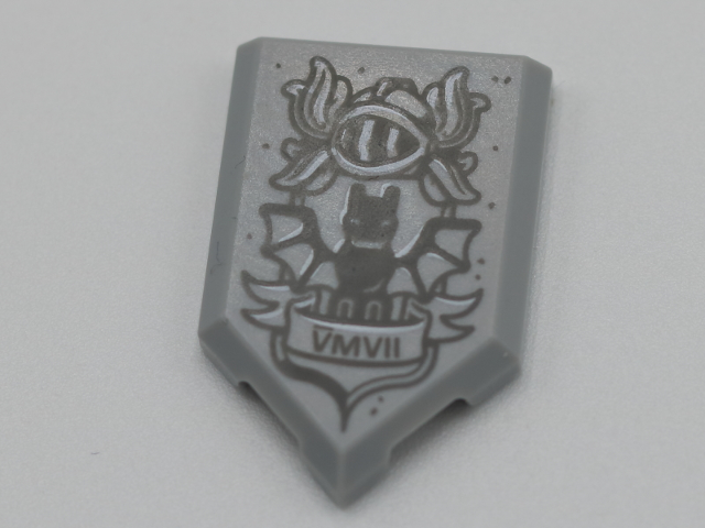 Tile, Modified 2 x 3 Pentagonal with Dark Bluish Gray Helmet, Plumes, Bat and 'VMVII' on Scroll Pattern