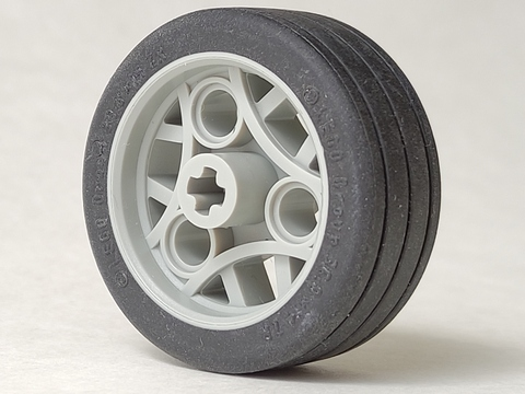 Wheel 36.8 x 14 ZR with Axle Hole and 3 Pin Holes with Molded Black Hard Rubber Tire Pattern
