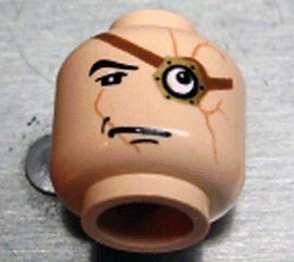 Minifigure, Head Black Eyebrow, Upper Eyelid, Gold Monocle with Reddish Brown Strap over Large White Eye, Medium Nougat Scars, Chin Dimple, Lopsided Frown Pattern