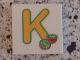 Part No: 3068pb0720  Name: Tile 2 x 2 with Letter K Yellow with Kiwi Pattern