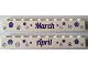 Part No: 6111pb016  Name: Brick 1 x 10 with Dark Purple 'March' and 'April' Pattern on Opposite Sides