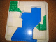 Part No: 6447px1  Name: Duplo, Baseplate Raised 24 x 24 with Straight Ramp and Blue, Green Pattern