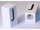 Part No: bb0695pb28  Name: Tile, Modified 1 x 2 x 5/6 Stud Hole in End with Black Capital Letter J Pattern