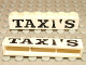Part No: crssprt02pb14  Name: Brick 1 x 6 without Bottom Tubes with Cross Side Supports with Black 'TAXI'S' Serif Bold Large Pattern