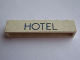 Part No: crssprt02pb38a  Name: Brick 1 x 6 without Bottom Tubes with Cross Side Supports with Blue 'HOTEL' Thin Pattern
