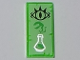 Part No: 3069pb0590  Name: Tile 1 x 2 with Black Goblin Eye and Silver Erlenmeyer Flask with Bright Green Vapors on Yellowish Green Parchment Background Pattern