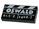 Part No: 3069pb1162  Name: Tile 1 x 2 with Film Slate with White 'OSWALD' and 'act:2 take:1' Pattern