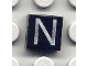 Part No: 3070pb022  Name: Tile 1 x 1 with Silver Capital Letter N Pattern
