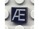 Part No: 3070pb037  Name: Tile 1 x 1 with Silver Capital Letter Æ Pattern