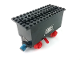 Part No: 3443c05pb01  Name: Train Battery Box Car with Two Contact Holes, Red Switch Lever, Blue and Red Magnets, Red Wheels, and Black Roof with '182' Pattern on Both Sides (Stickers) - Set 182